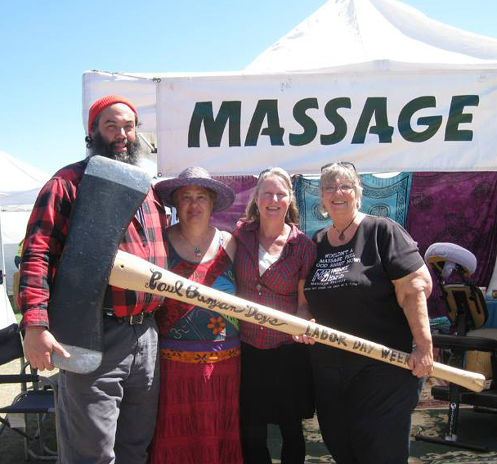 Craft Fair pic with Paul Bunyan at massage booth